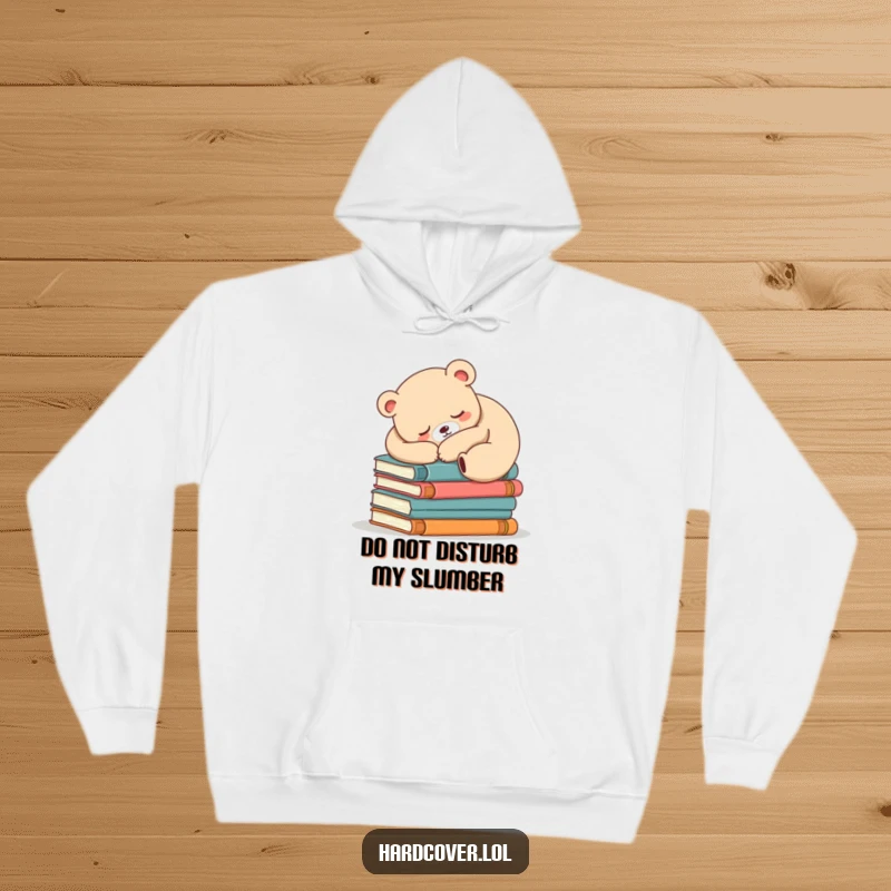 Funny sleepy bear design on a cozy hoodie, bear is sound asleep on a huge pile of books, perfect for readers.