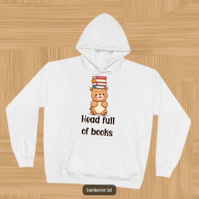 Funny hoodie featuring a happy bear balancing a large pile of books overhead, offering warmth and a touch of literary humor.